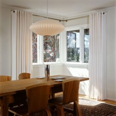 White modern curtains in a modernist dining room in San Francisco